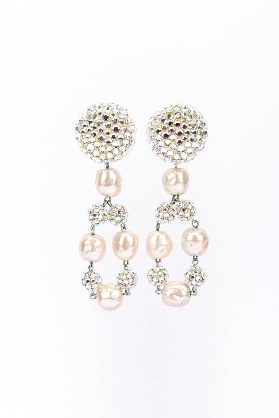 Pearl drop earrings by James Arpad on white background side by side @recessla