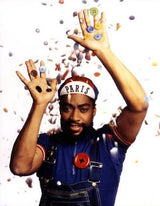 button brooch worn by Patrick Kelly tossing buttons