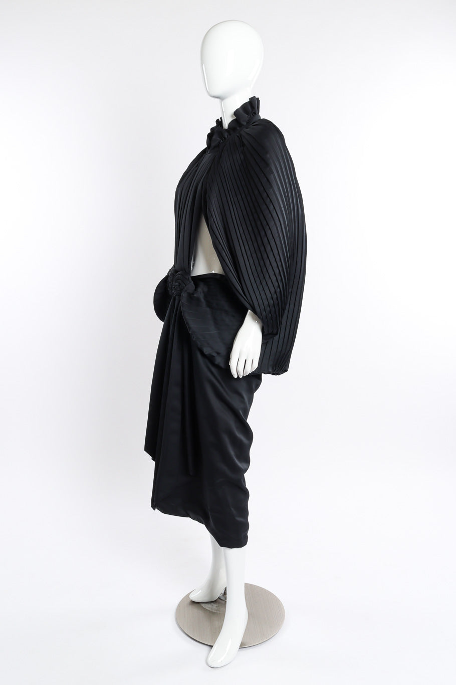 Pleated Cocoon Coat by Calderon on mannequin side @recessla