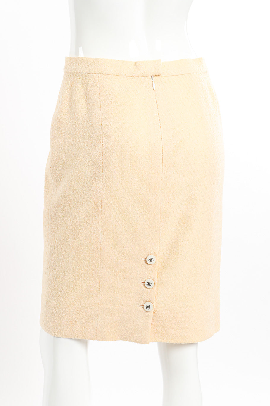 Chanel Knit Bouclé Jacket and Skirt Set skirt back on mannequin closeup @recessla