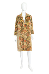 Vintage floral chenille carpet coat on mannequin @ Recess LA