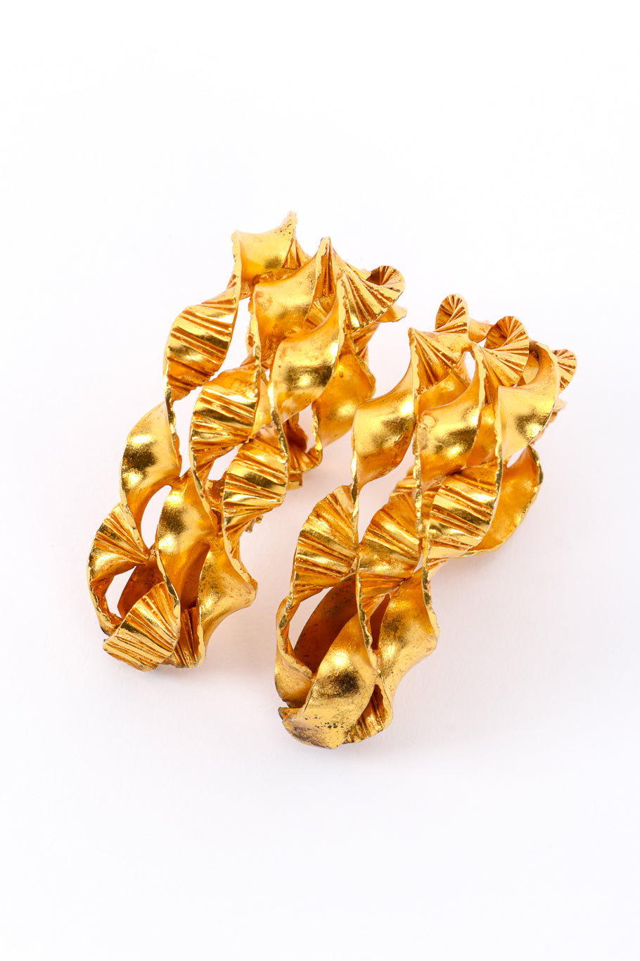 Sculpted Ribbon Twist Hoop Earrings by Dominique Aurientis on white background close from front @recessla