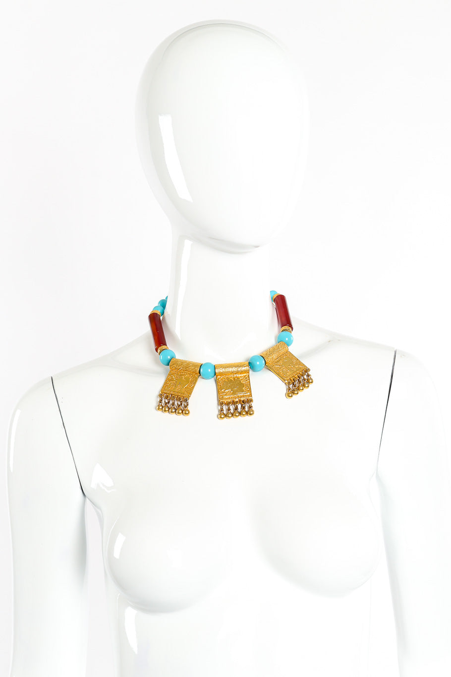 Pendant necklace by Donald Stannard on white background on mannequin neck @recessla