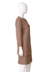 jacket and skirt suit by Valentino on mannequin side @ Recess LA