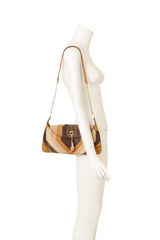 Vintage Tom Ford for Gucci Metallic Geo Tiger Charm Bag on mannequin @ Recess LA