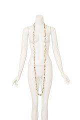 Vintage Julie Rubano Long Coin Charm Necklace on mannequin @ Recess LA