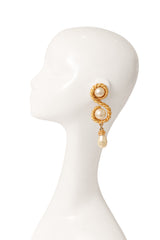 Double pearl twist earrings by Chanel on mannequin @ Recess LA