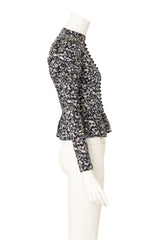 peplum blouse by Saint Laurent on mannequin side @ Recess LA