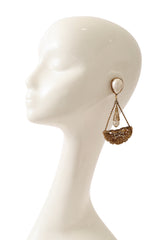 Filigree Pearl Drop Pendulum Bow Earrings on mannequin @ Recess LA