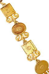 Ornate link bracelet with textured amber-tone glass panels and gold scrollwork by Shadow Paris back signatures @ Recess LA