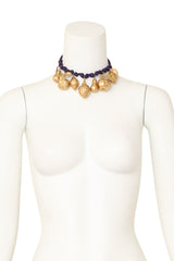 Gilded fruit charm necklace on mannequin @ Recess LA