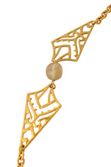 Filigree panel drop necklace with geometric openwork details beads up close @ Recess LA