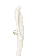 Shell mosaic evening bag by Genie on mannequin side @ Recess LA