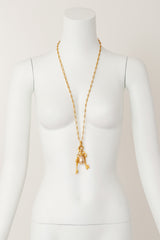 Key charm necklace by Kenneth Lane on mannequin @ Recess LA