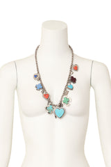 Sterling silver charm necklace on mannequin @ Recess LA