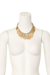 hammered charm necklace by Yves Saint Laurent on mannequin @ Recess LA