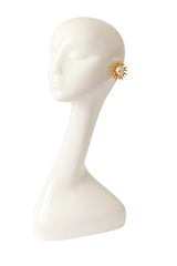 sun button earrings by Philippe Ferrandis on mannequin @ Recess LA