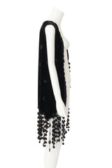 fringe vest by Moschino on mannequin side @ Recess LA