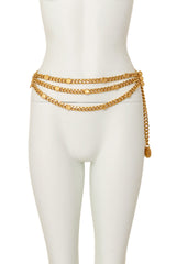 Chunky gold triple-strand draped logo chain belt by St. John on mannequin @ Recess LA