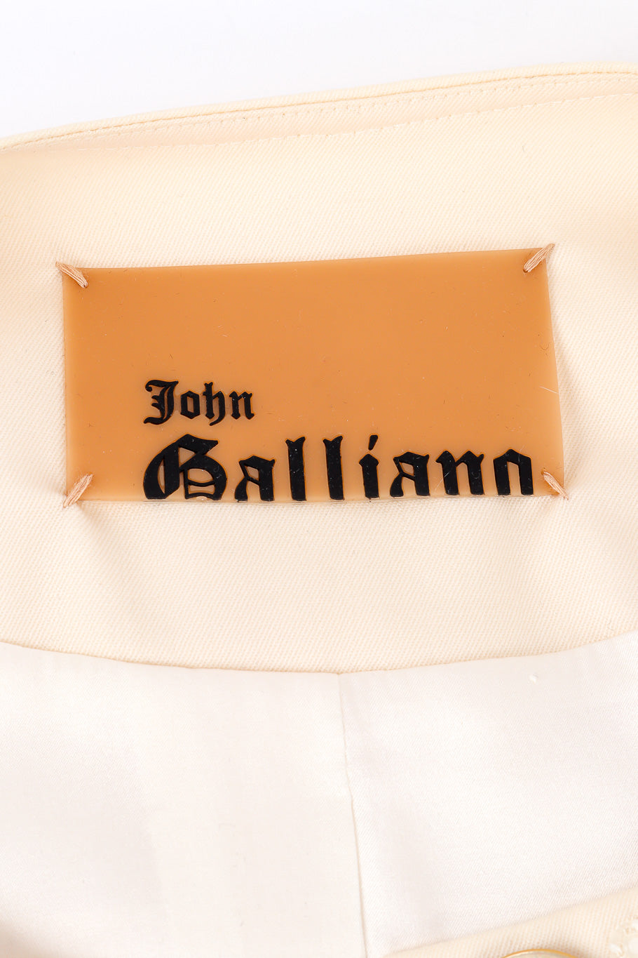 Skirt suit by John Galliano flat lay jacket label @recessla