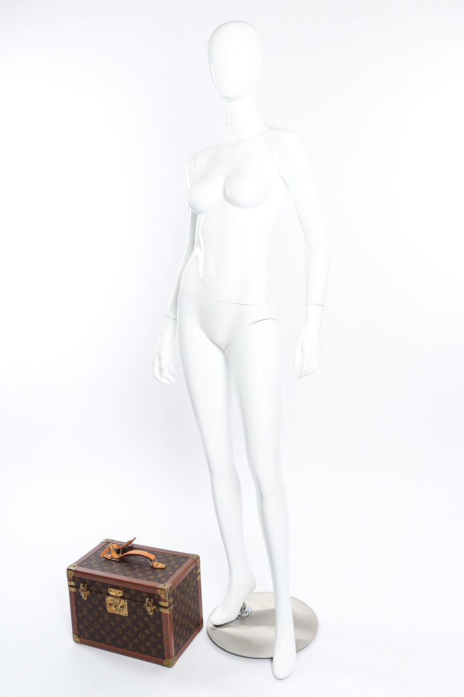 Vintage Louis Vuitton Classic Monogram Vanity Case on the floor next to mannequin for size reference @Recessla