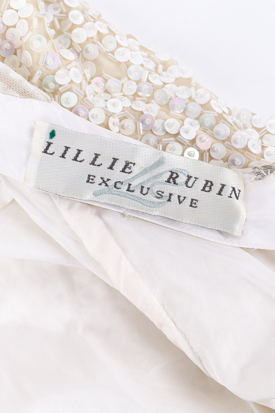 Beaded gown by Lillie Rubin on flat lay label @recessla