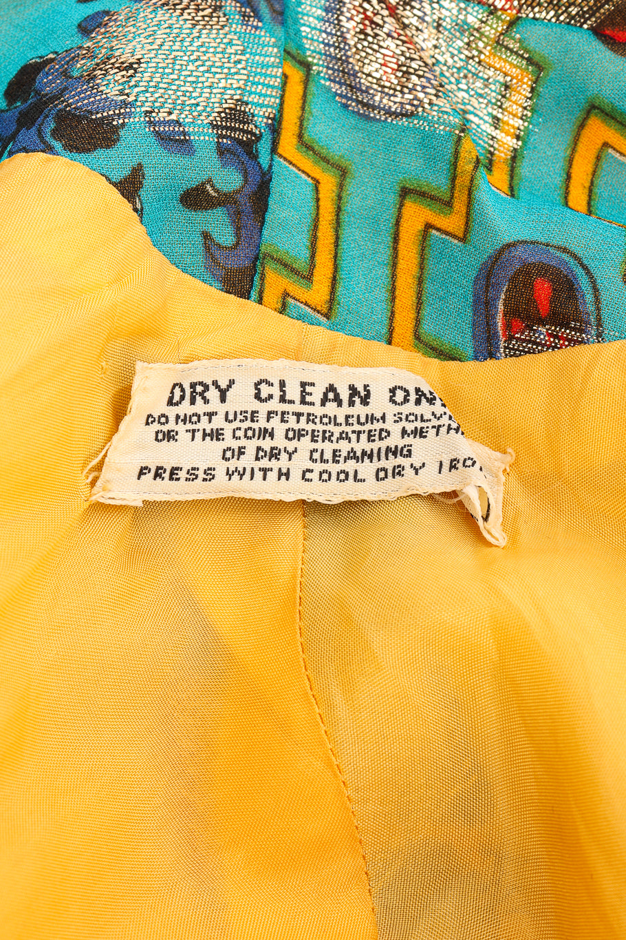Vintage Malcolm Starr Paisley Print Hostess Dress care instruction label closeup @Recessla
