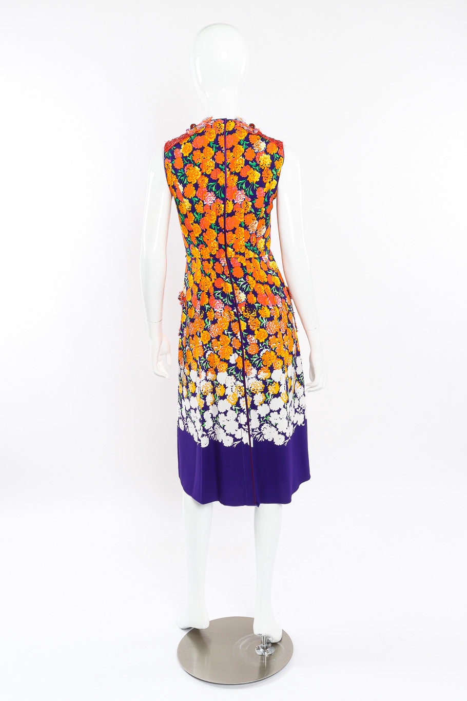 Floral lamé knit sequin dress by Marc Jacobs on mannequin back @recessla