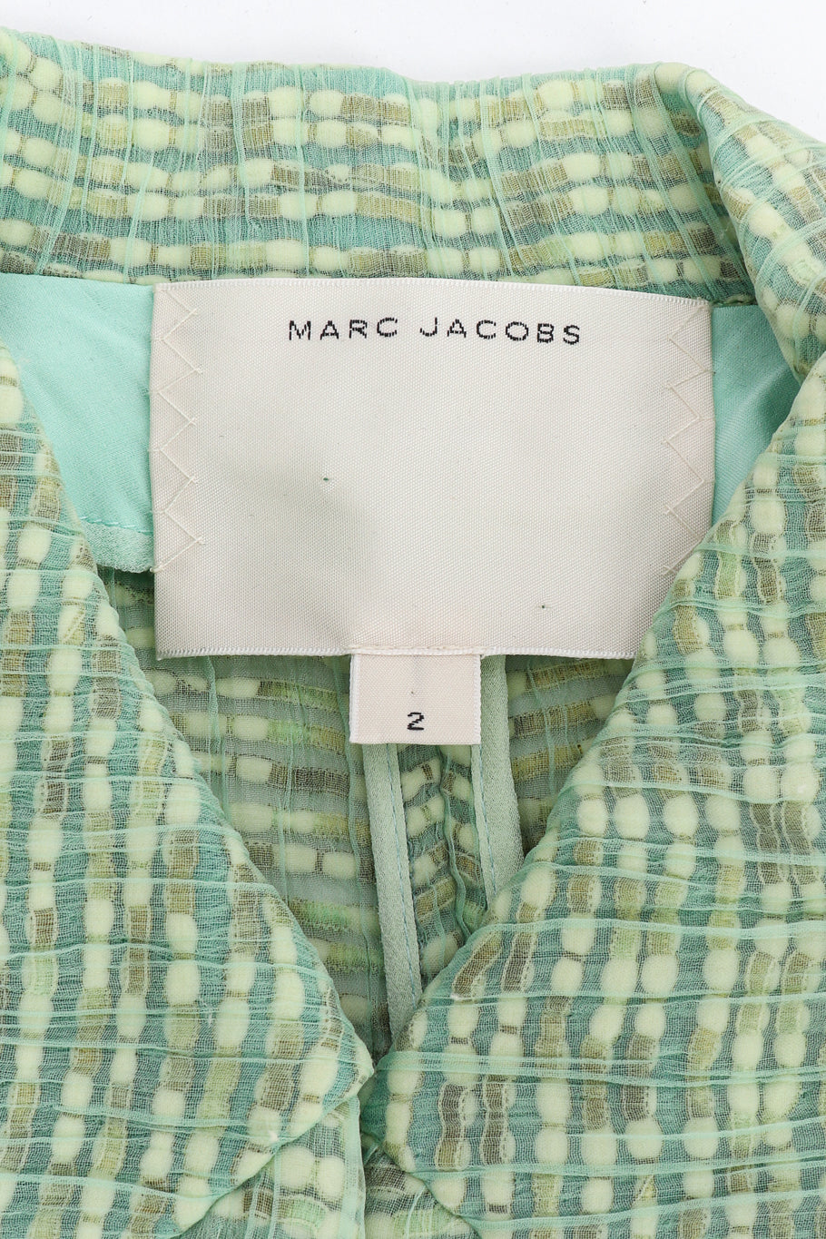 Jacket and skirt set by Marc Jacobs label close @recessla