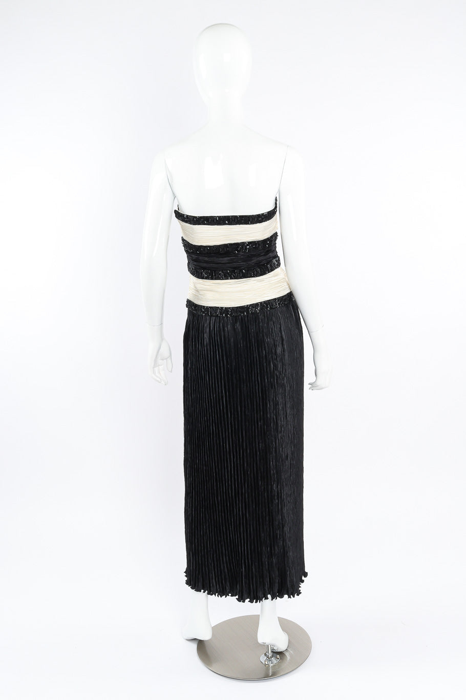 Plisse dress by Mary McFadden on mannequin back @recessla