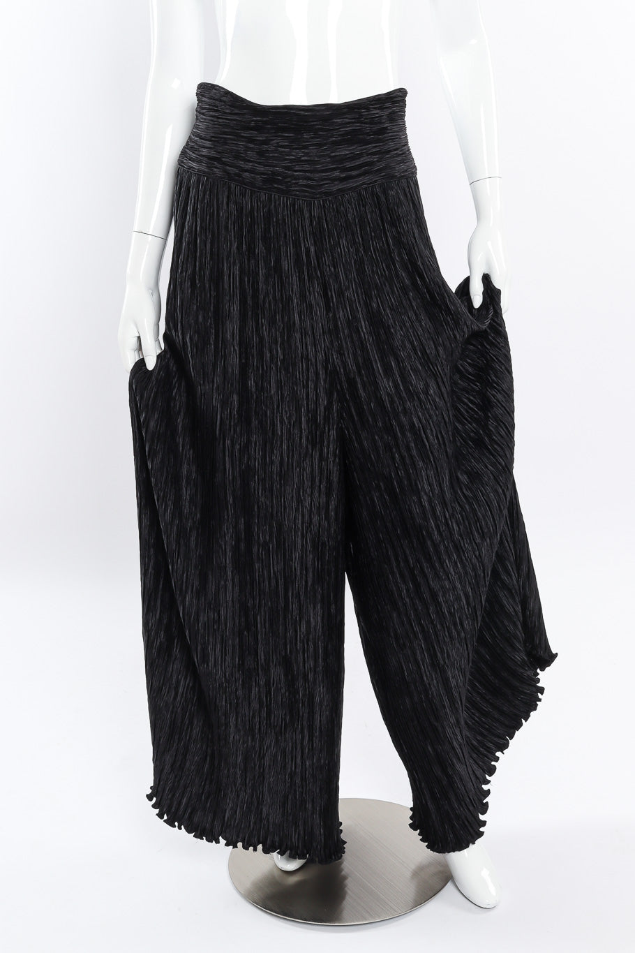 Pleated palazzo pant by Mary McFadden on mannequin front pulling out pant legs with hands @recessla