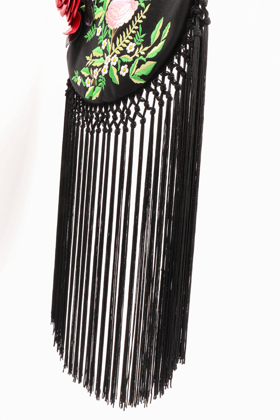 Fringe shoulder bag by Moschino on white background hanging fringe close @recessla