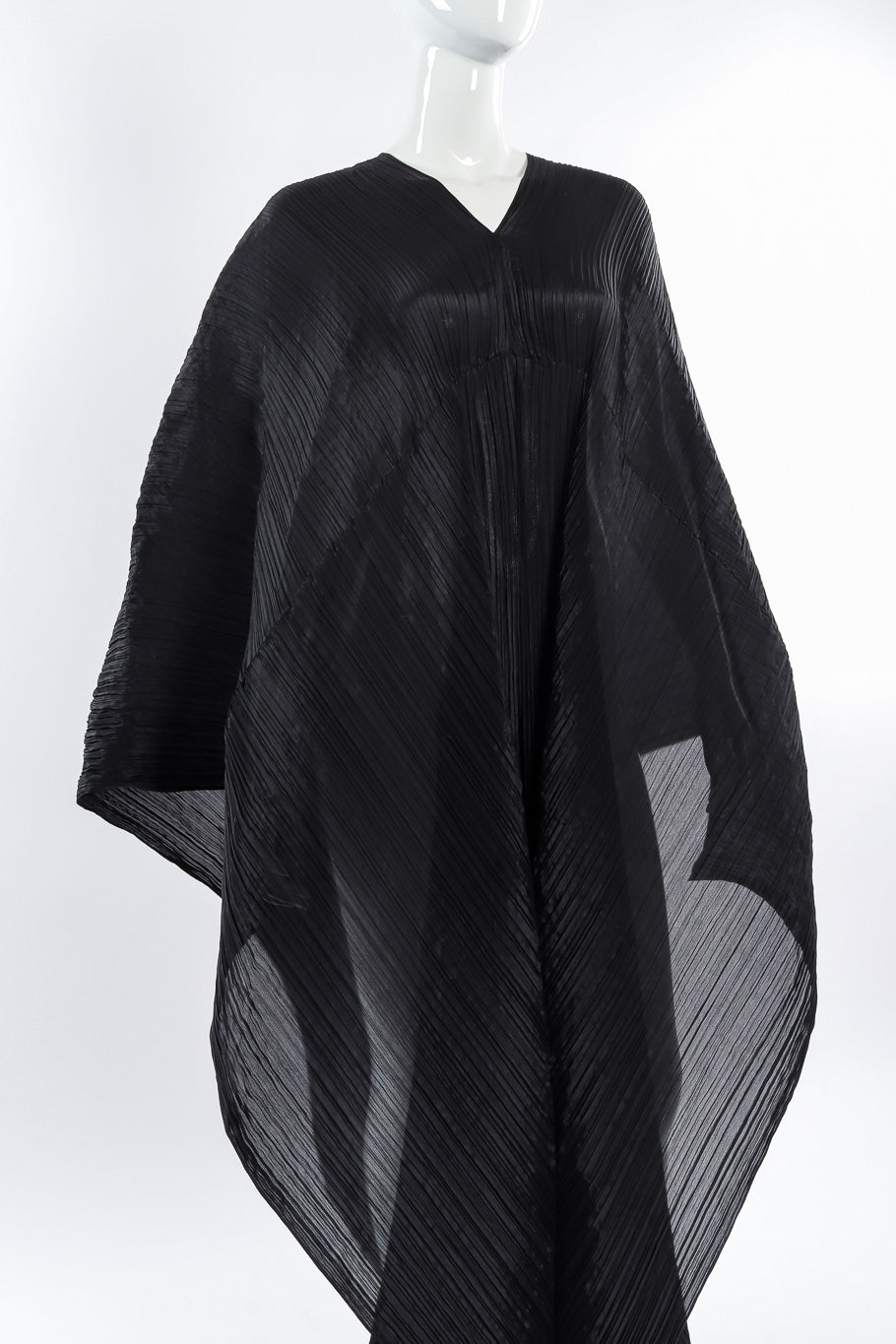 Pleats Please Issey Miyake Pleated Multi-Wrap Poncho II front view on mannequin closeup @Recessla