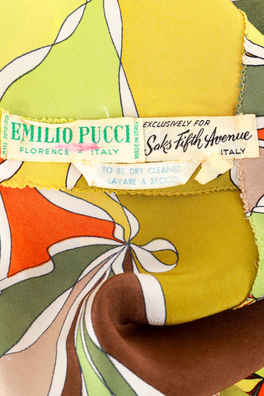 Vintage Emilio Pucci ruffle tunic high waisted trouser set flat lay detail of the makers label reading 'Emilio Pucci