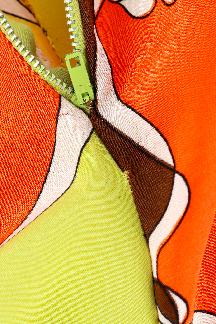 Vintage Emilio Pucci ruffle tunic high waisted trouser set flat lay close up detail of the pulls to the seam at the zipper in the pants  @RECESS LA