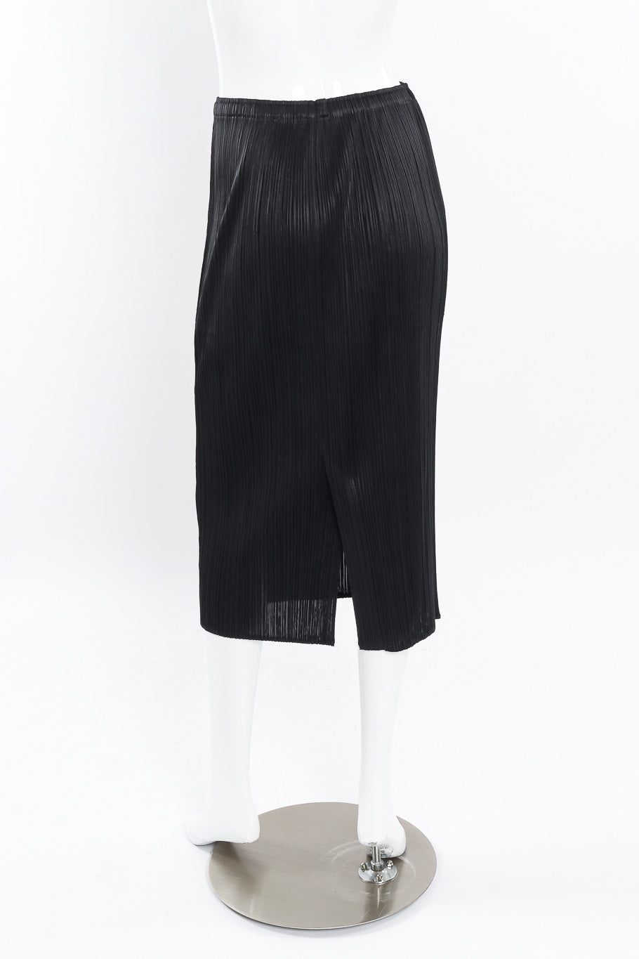 Pleated skirt, top, and jacket set by Issey Miyake on mannequin back skirt only @recessla