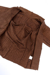 Textured three piece set by Issey Miyake flat lay jacket open @recessla