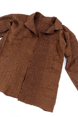 Textured three piece set by Issey Miyake flat lay jacket closed @recessla