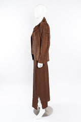 Textured three piece set by Issey Miyake on mannequin side @recessla