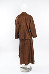 Textured three piece set by Issey Miyake on mannequin back @recessla