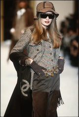 Coin charm belt by Chanel charms on runway on model