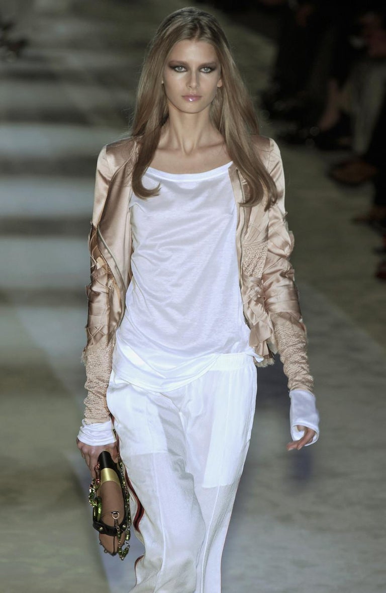Silk jacket by Gucci on model on runway from Vogue archives @recessla