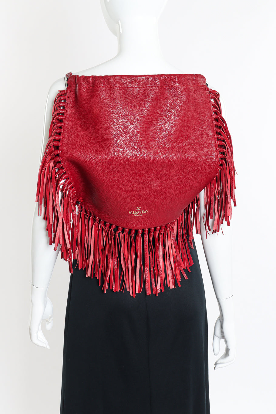 Garavani 'C-Rockee' Fringed Leather Backpack by Valentino on mannequin @recessla