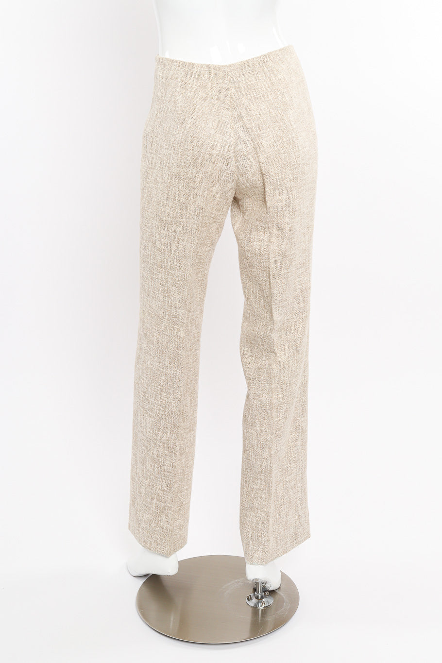 Vest and pants set by Véronique on mannequin pants only back @recessla