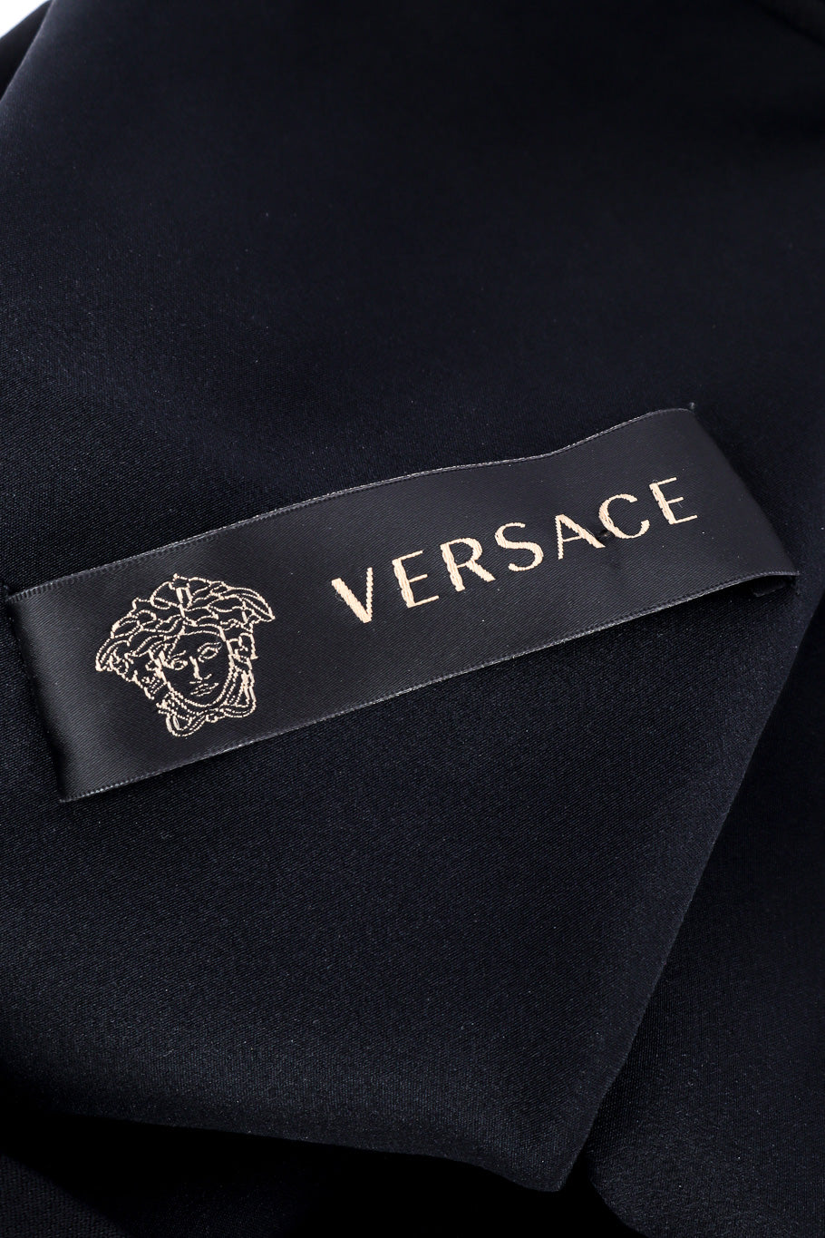 Versace Asymmetric Cut-Out Dress label closeup @Recessla