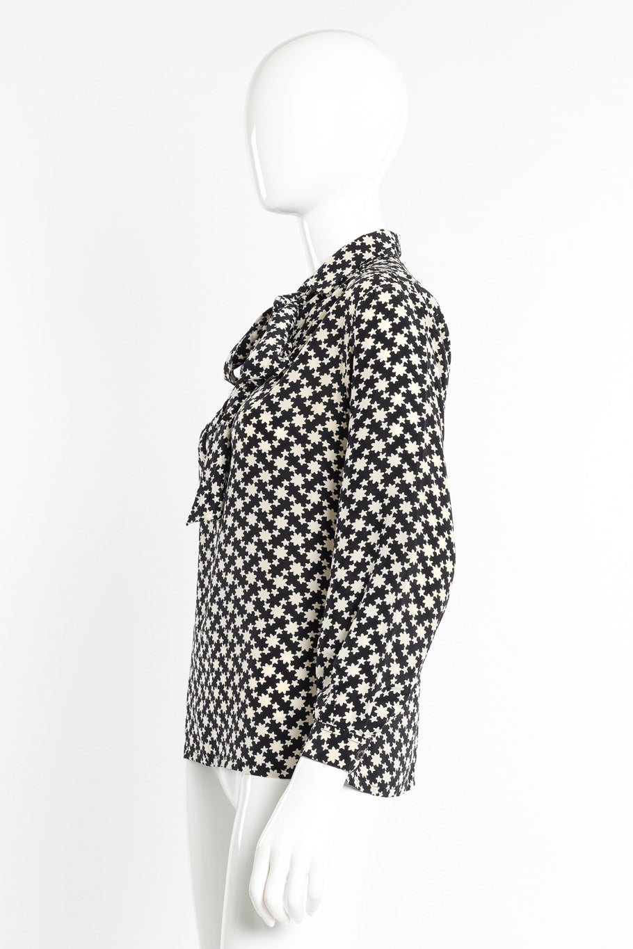 Star print blouse by Yves Saint Laurent on mannequin side @recessla