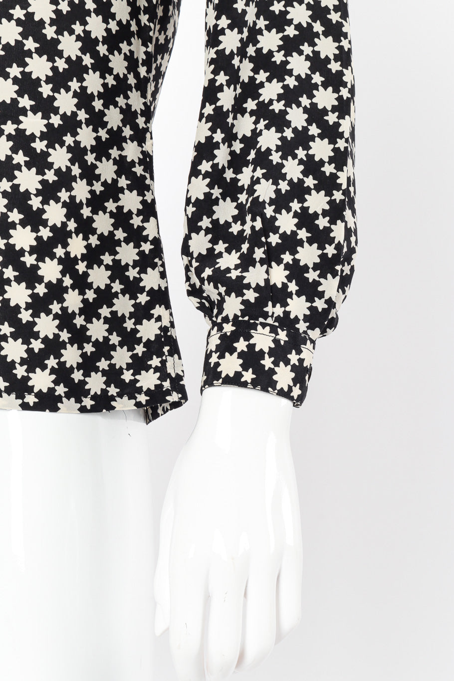 Star print blouse by Yves Saint Laurent on mannequin sleeve cuff close @recessla