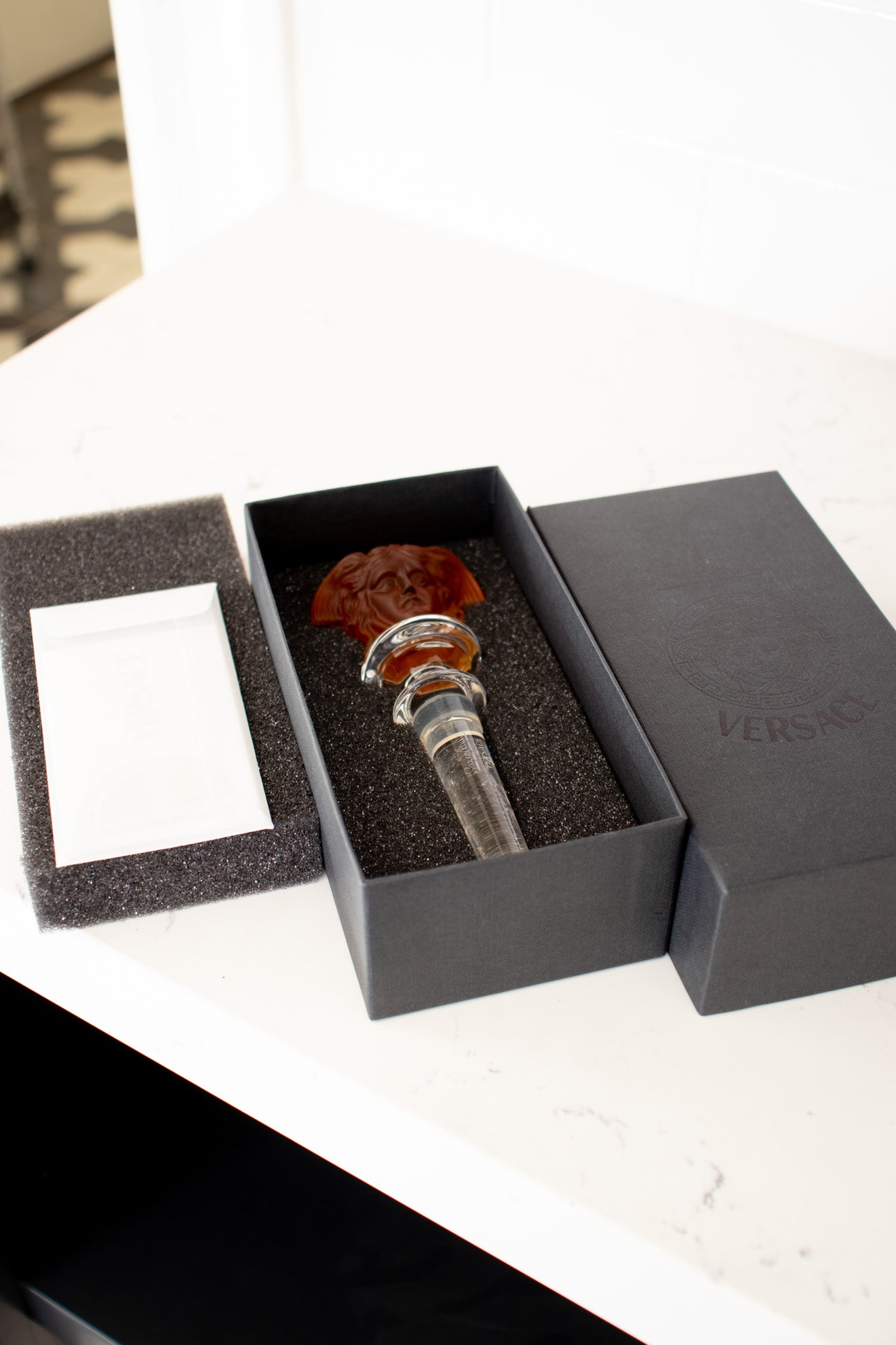 Vintage Versace Rosenthal Amber Medusa Crystal Bottle Stopper in box at Recess Home Los Angeles