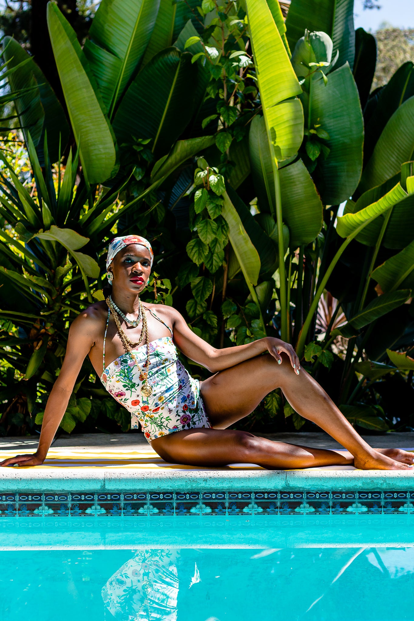 Monica Ahanonu in Vintage Gucci Flora Print Maillot Swimsuit and Flora scarf at Recess Los Angeles