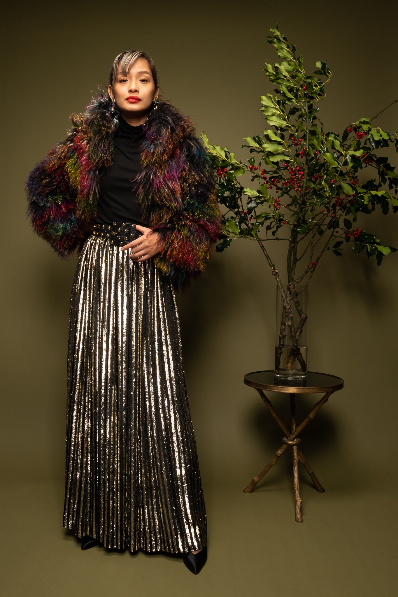 girl in Vintage Adolfo Velvet Lamé Stripe Skirt & Armani rainbow Mongolian fur on olive @ Recess LA